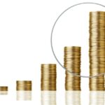 Bild myntstaplar som symboliserar fondsparande